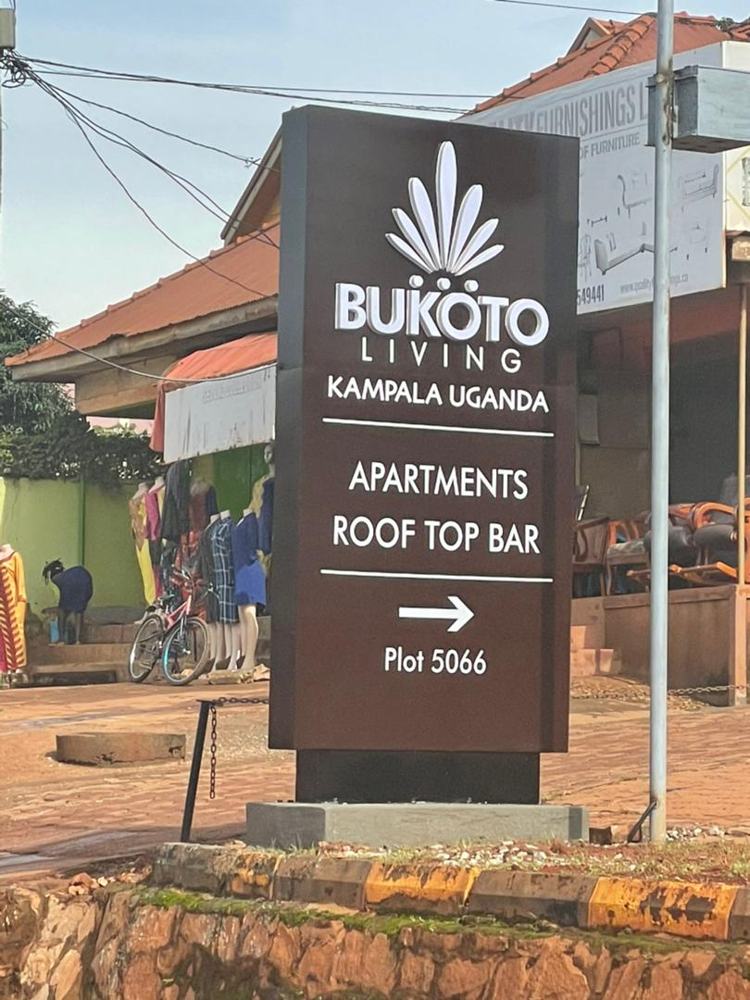 Bukoto Living entrance pylon sign