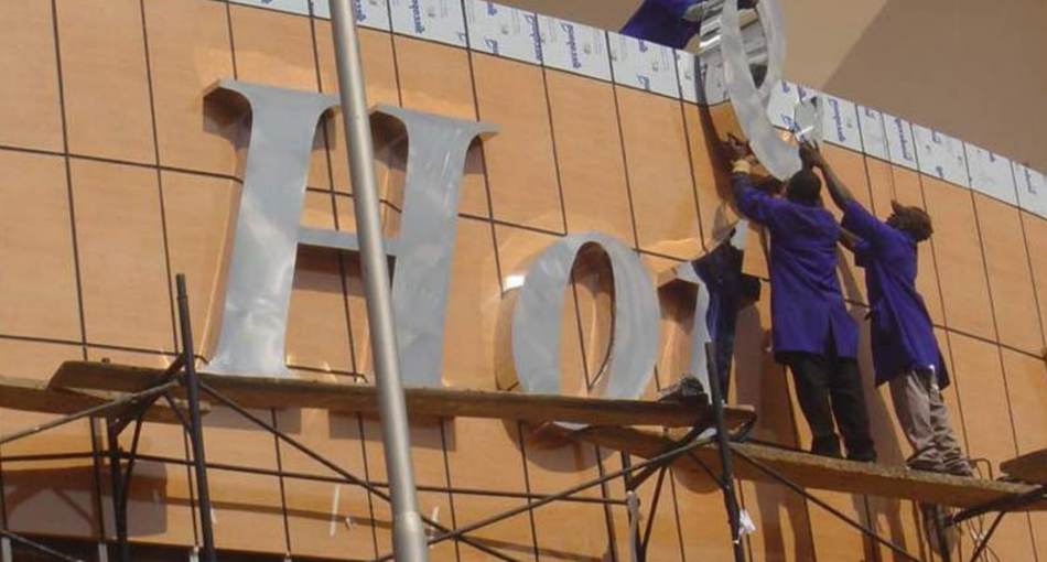Hotel channel letters — installation in progress