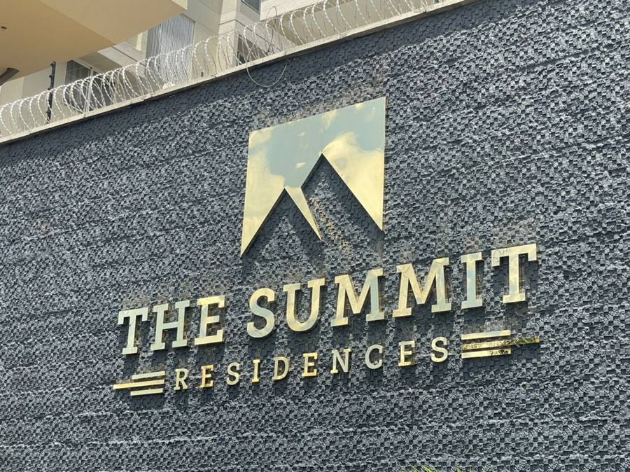 The Summit Residences — brushed gold building lettering by Crane Engravers