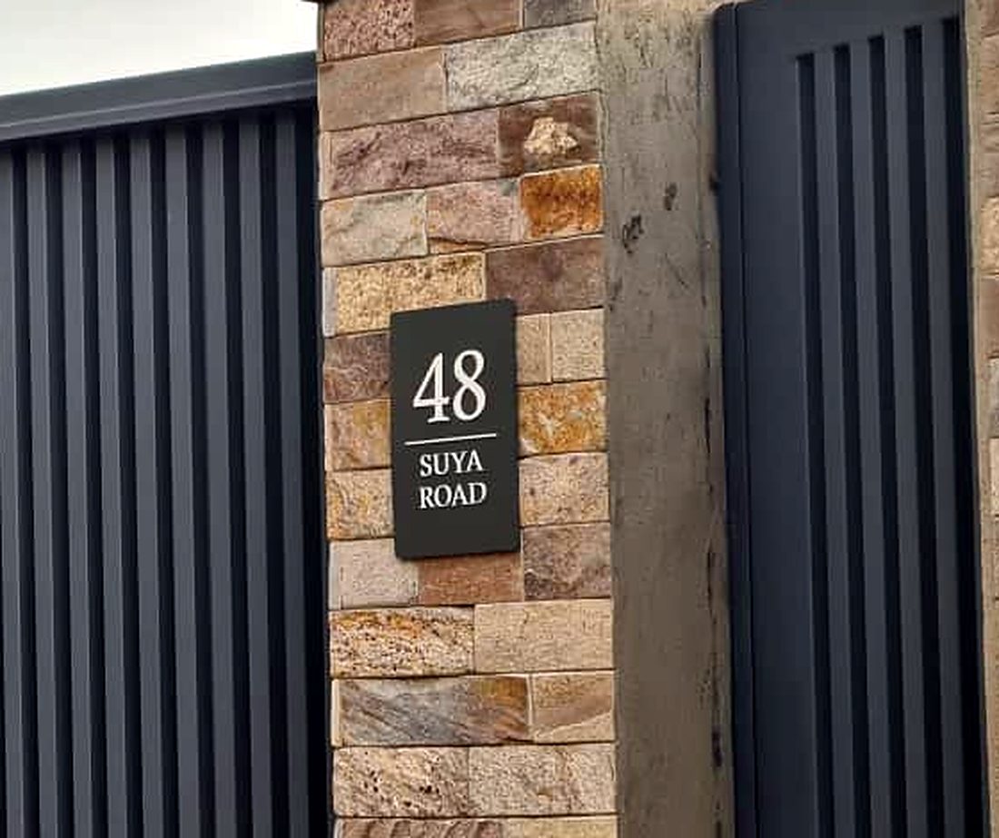 48 Suya Road — plot number plate